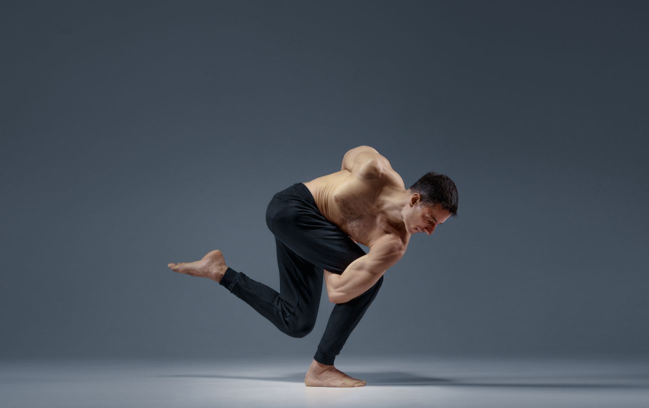 man doing one of the most difficult yoga poses