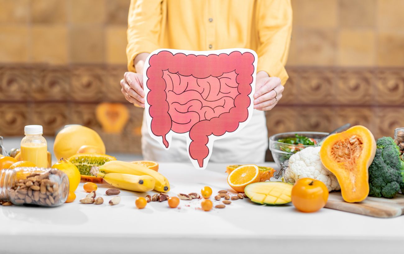 intestine picture with fruit and veg around it 