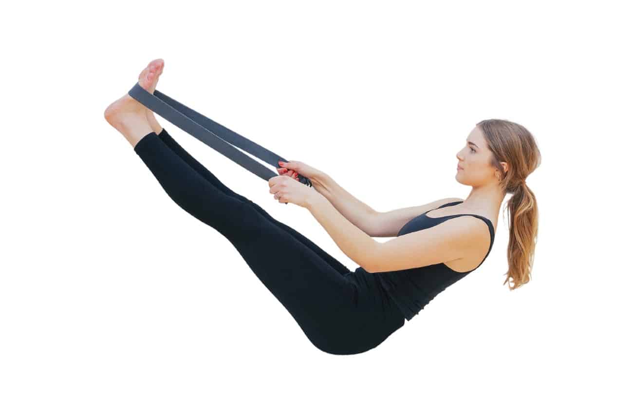 a woman doing Boat pose with a strap