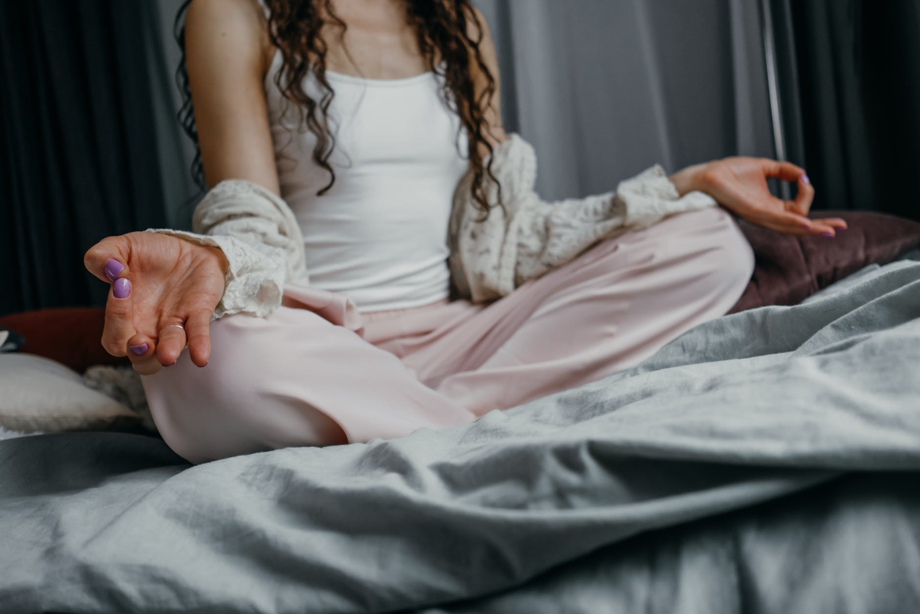 woman doing meditation before bed