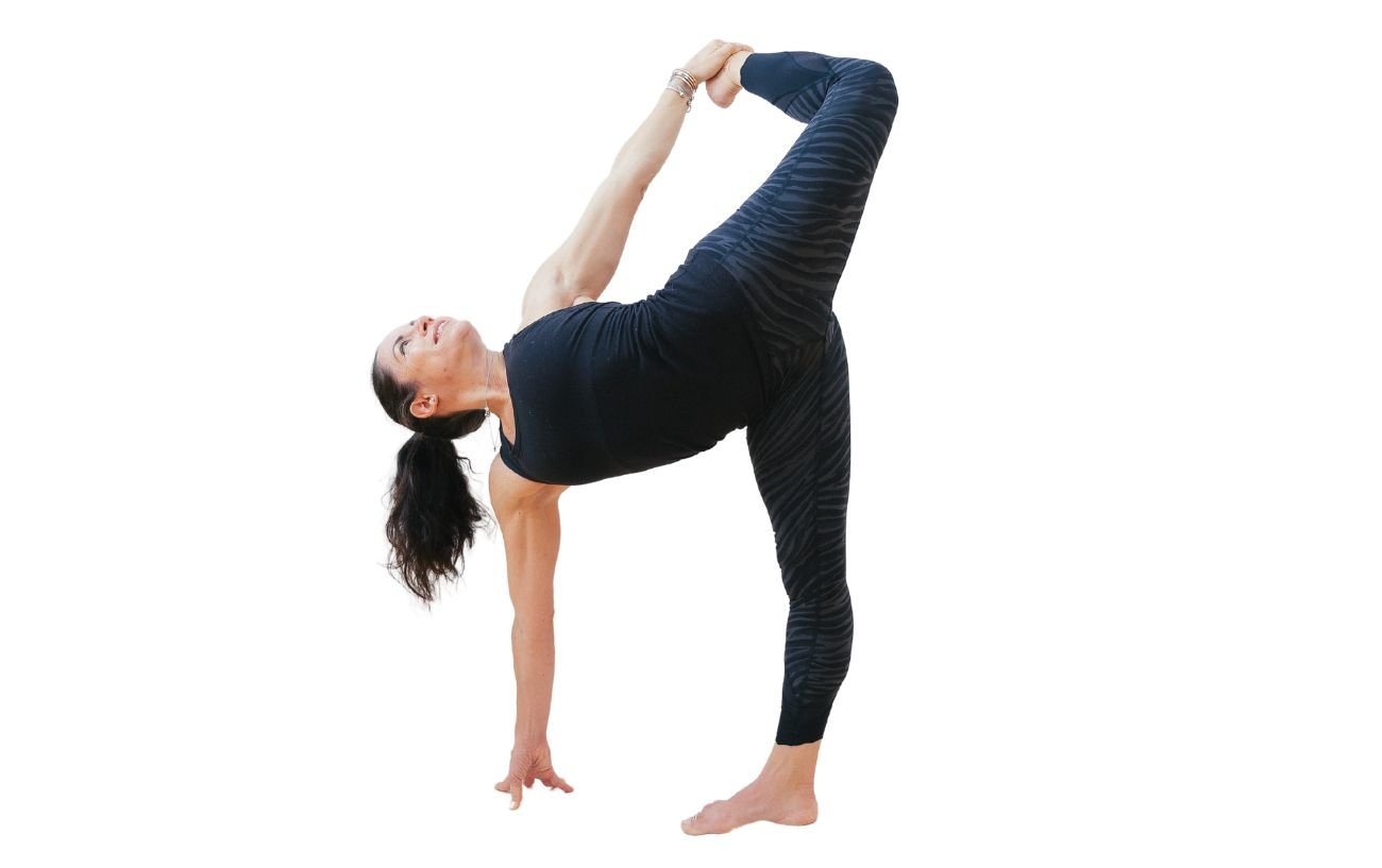 a woman in black yoga clothes doing sugarcane pose